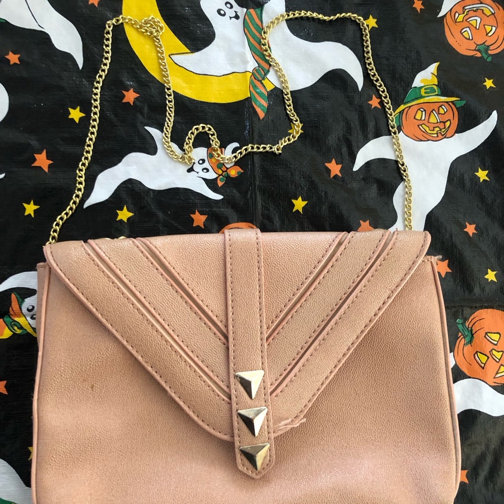 PEACH GOLD STUDDED BCBG BAG shown during live sale